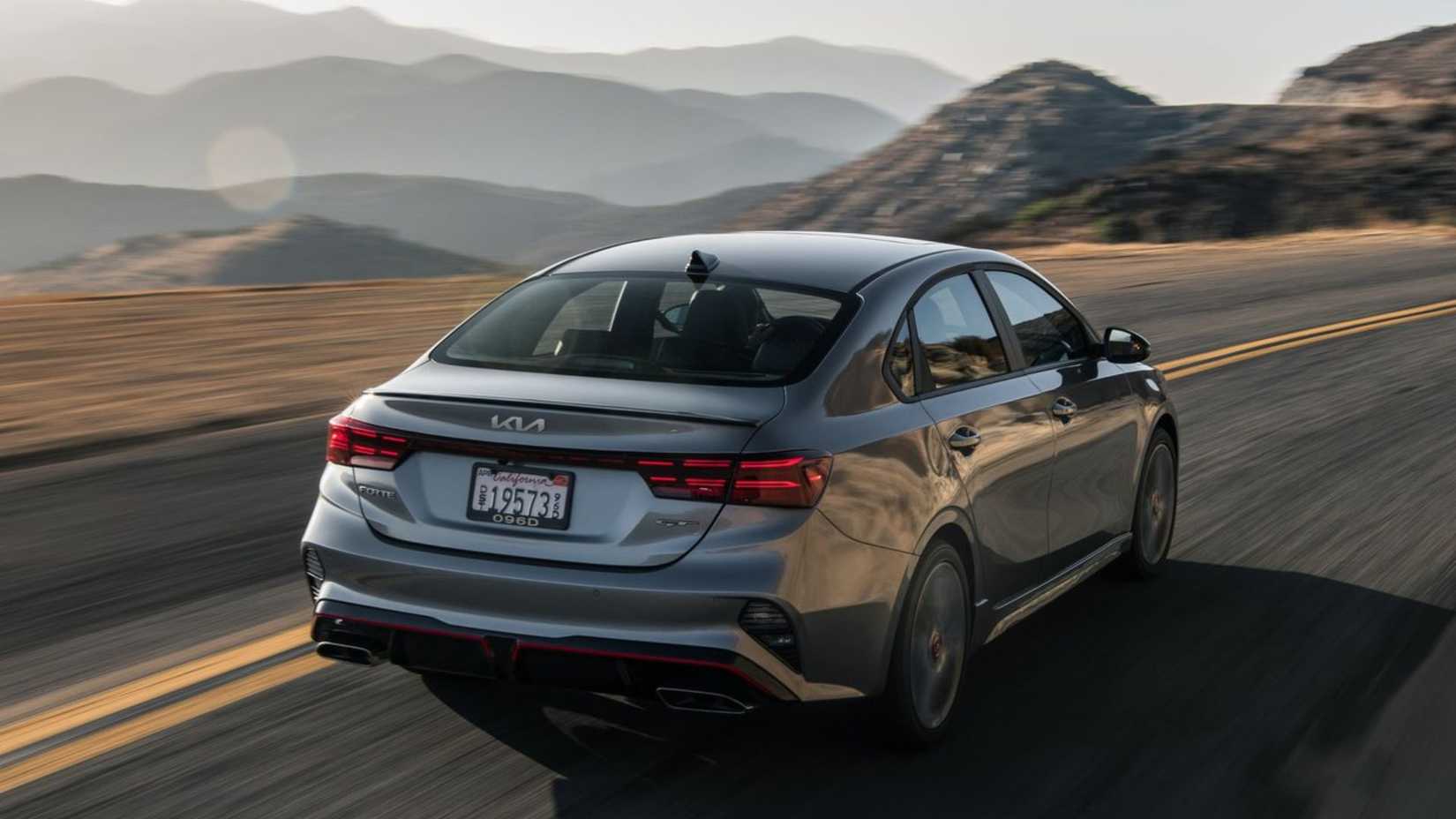 Dynamic rear 3/4 shot of a 2022 Kia Forte.