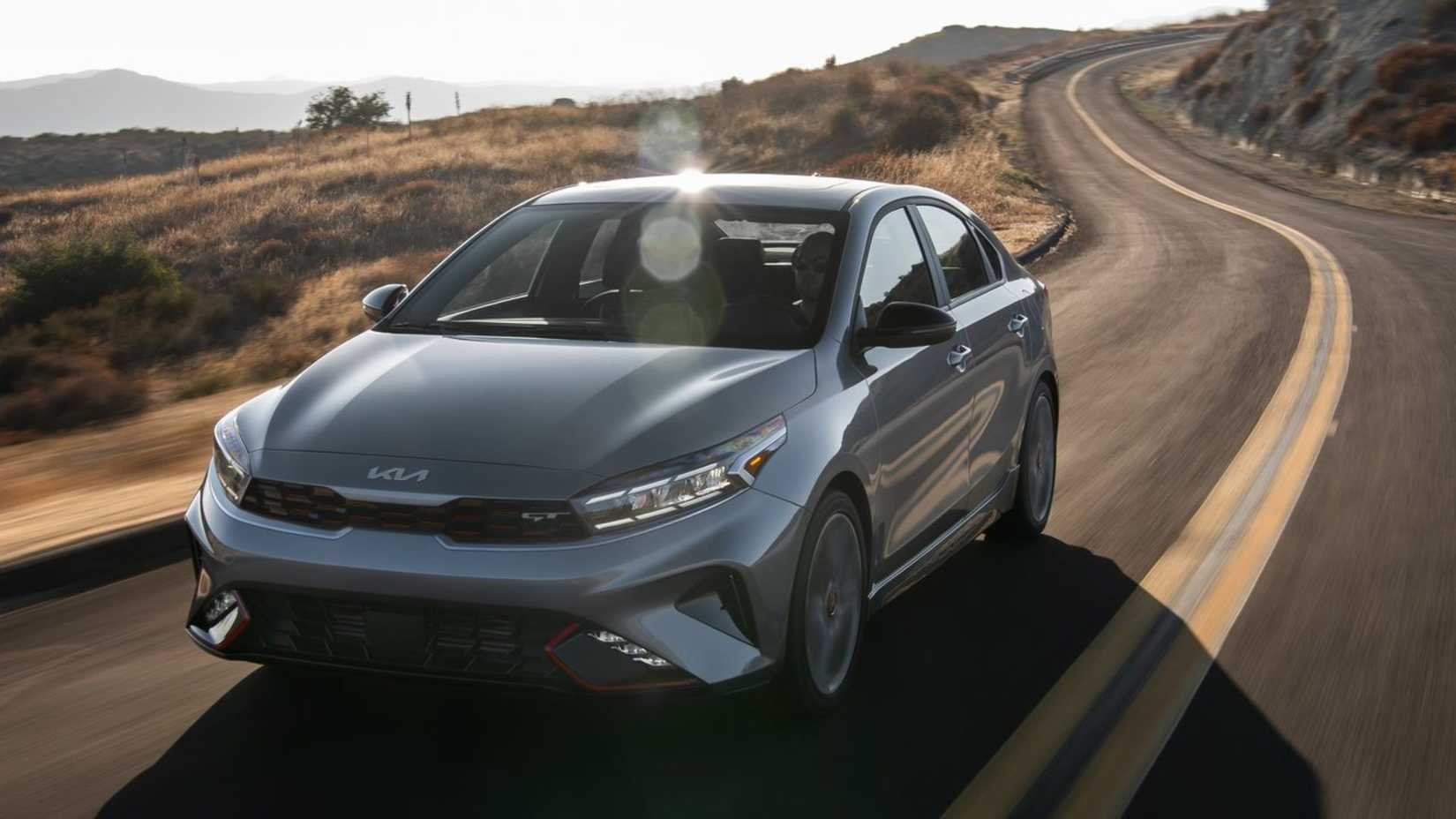 Dynamic front-end shot of a 2022 Kia Forte.