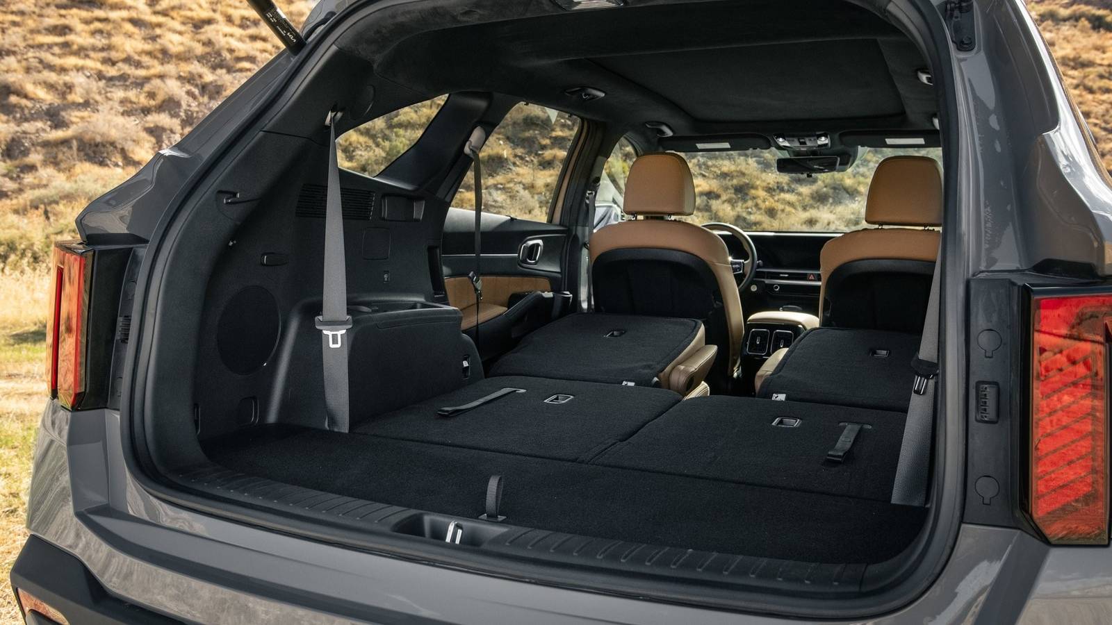 Shot of the open trunk of a 2024 Kia Sorento with the rear seats folded down