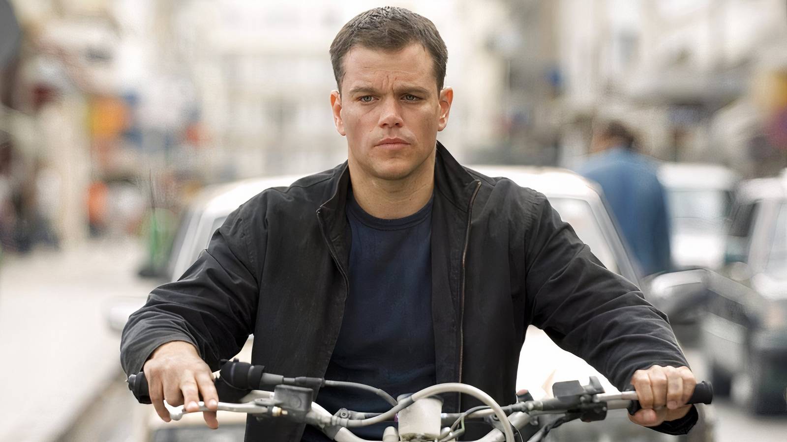 Matt Damon on a motorcycle in The Bourne Ultimatum.