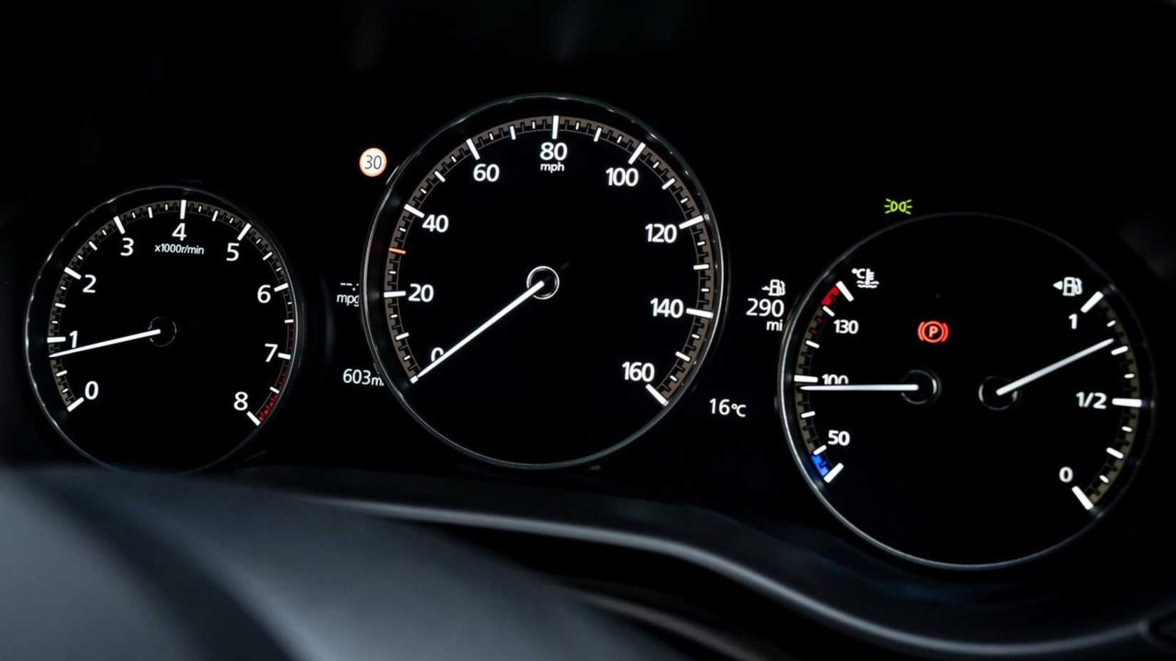 Close-up shot of the instrument gauges in a 2019 Mazda3 Sedan.