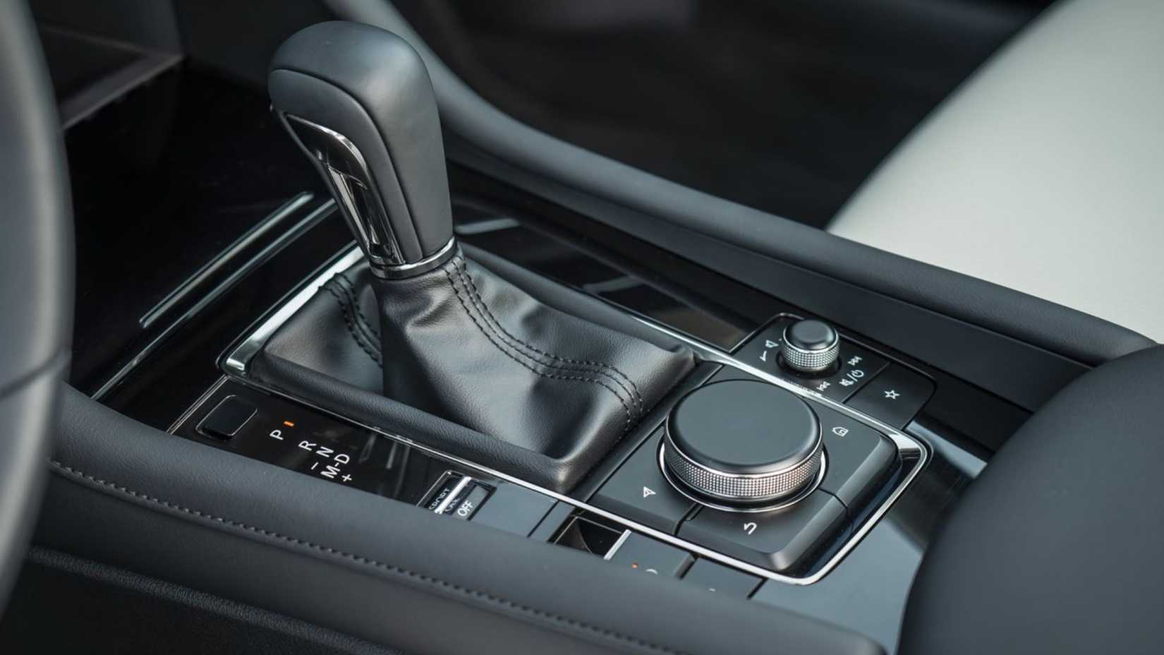 Close-up shot of the gear shifter in a 2019 Mazda3 Sedan.