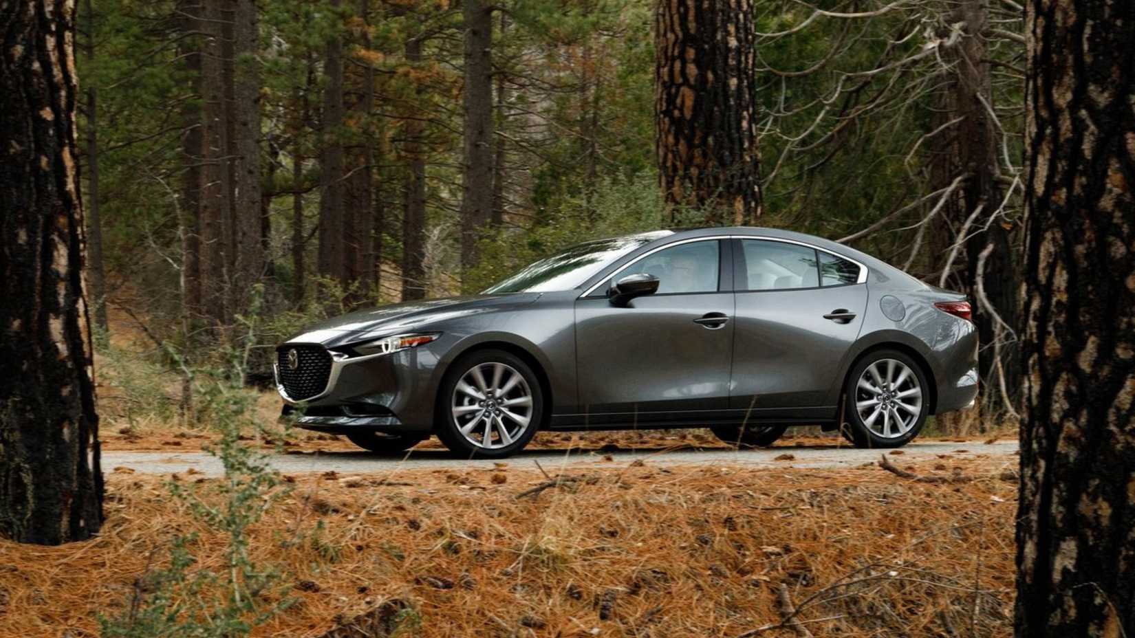 Static side profile shot of a 2019 Mazda3 Sedan.