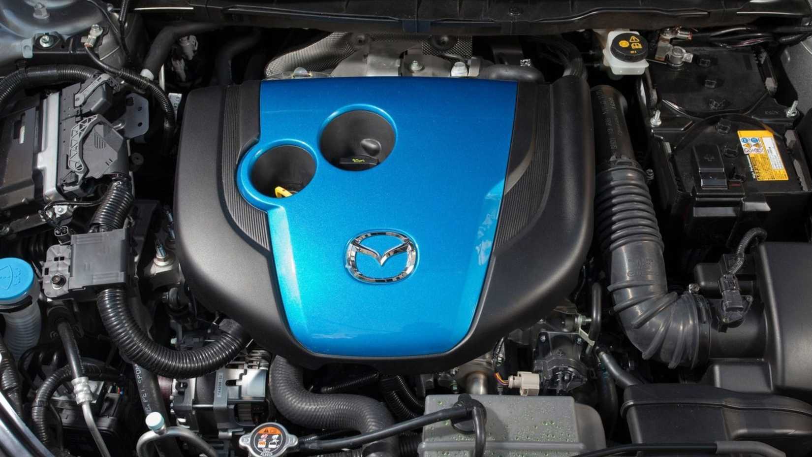 Shot of the engine under the hood of a 2013 Mazda CX-5.