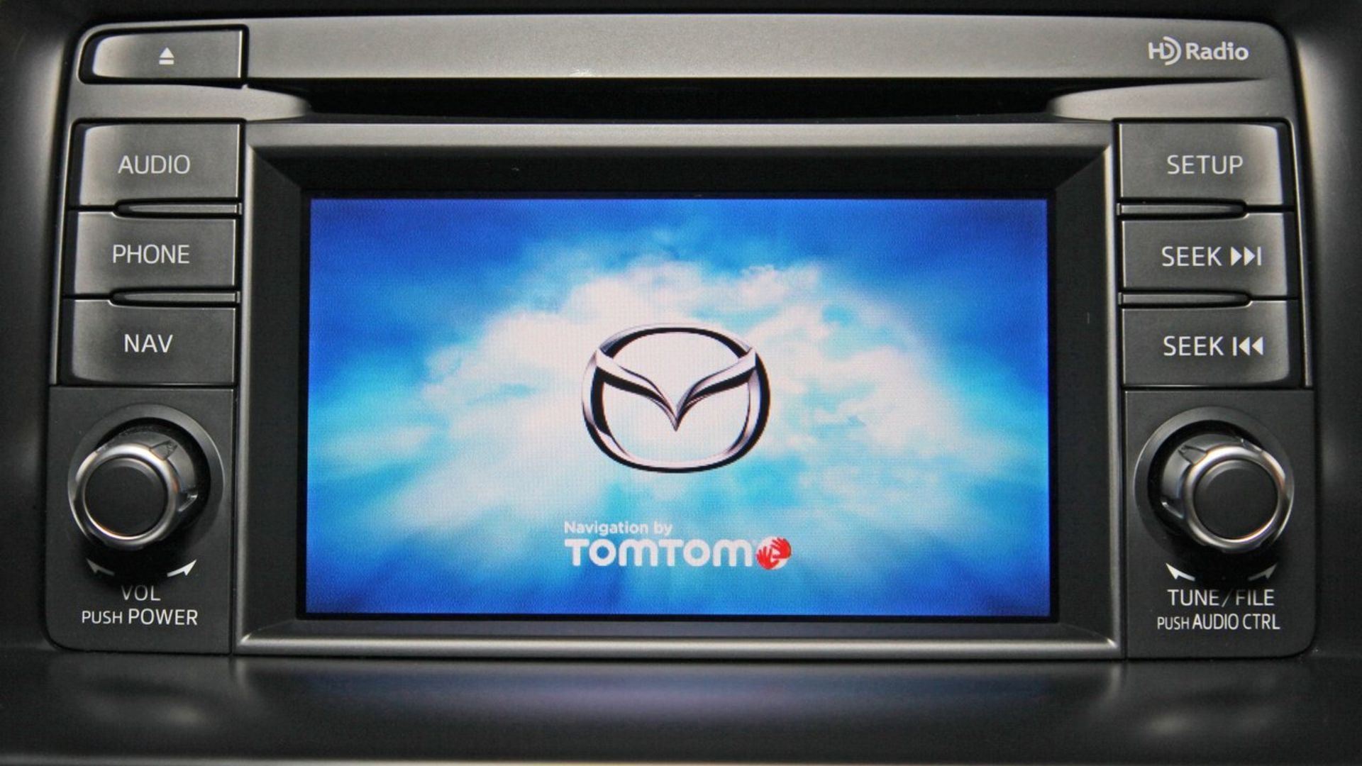 Close-up shot of the infotainment system in a 2013 Mazda CX-5.