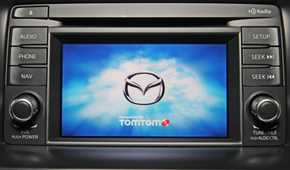 Close-up shot of the infotainment system in a 2013 Mazda CX-5.
