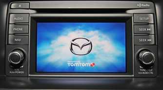 Close-up shot of the infotainment system in a 2013 Mazda CX-5.