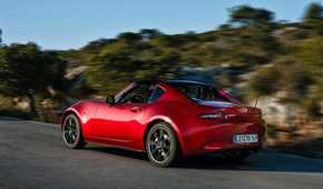 Dynamic rear 3/4 shot of a 2017 Mazda MX-5 RF.