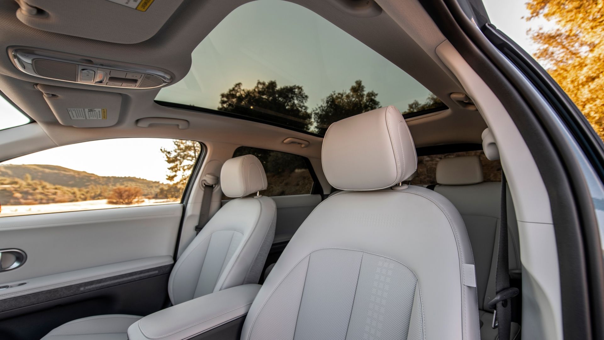 Shot of the front seats and glass roof in a 2022 Hyundai Ioniq 5