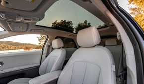 Shot of the front seats and glass roof in a 2022 Hyundai Ioniq 5