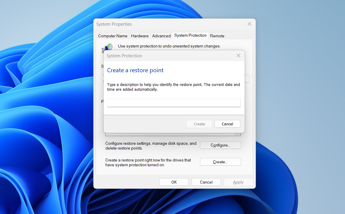 A prompt asking for the description to create a restore point on Windows.
