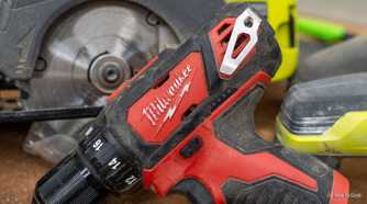 milwaukee-m12-drill-driver-close-up-with-ryobi-circular-saw-behind-1
