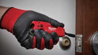Person using Milwaukee FASTBACK as a screwdriver.