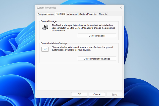 The System Properties window opened and displaying the Hardware tab.