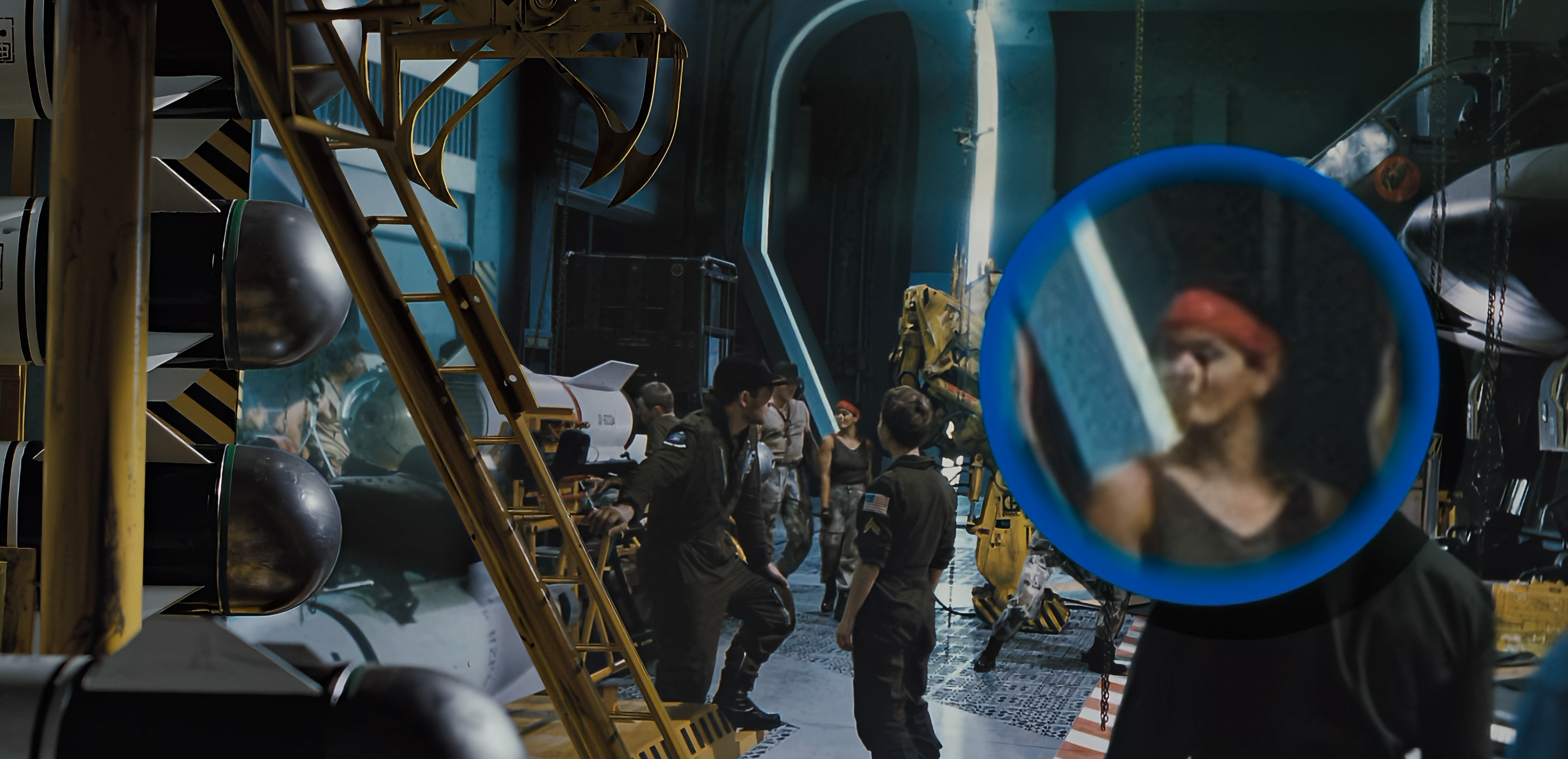 A circled background character displays a distorted face in the 4K remaster of Aliens.