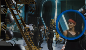 A circled background character displays a distorted face in the 4K remaster of Aliens.