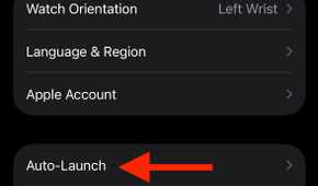Apple Watch app General settings page with arrow pointing to Auto Launch.