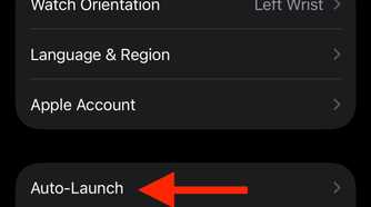 Apple Watch app General settings page with arrow pointing to Auto Launch.