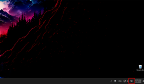 Windows 11 system tray with the energy saver icon, indicating that energy saver is active.