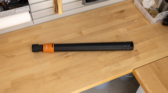 Photo of the Ridgid LA2518 extendable wand on a workshop table