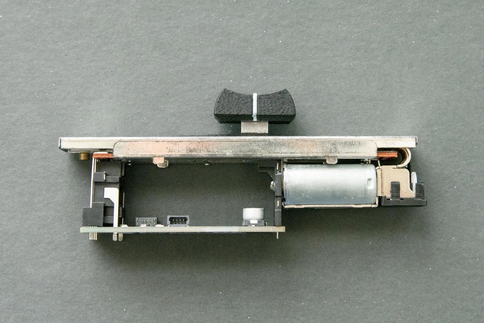 Side profile of a FaderBuddy.
