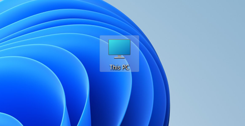 The This PC icon is selected on the Windows 11 desktop.