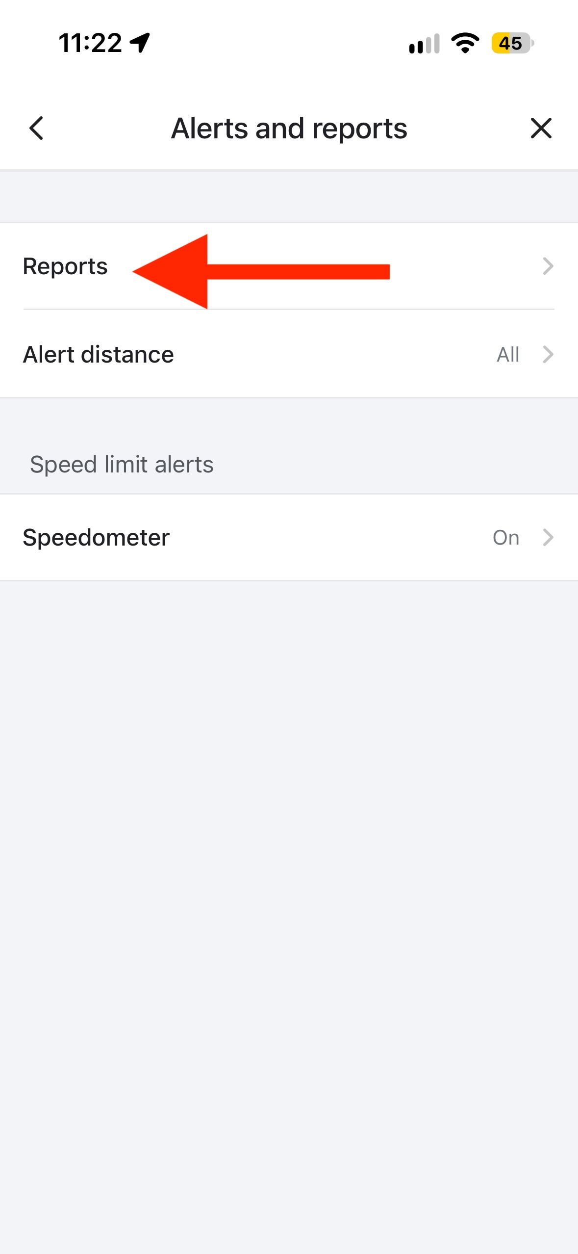 Waze Alerts and reports page with arrow pointing to Reports showing Alert distance and Speedometer options.