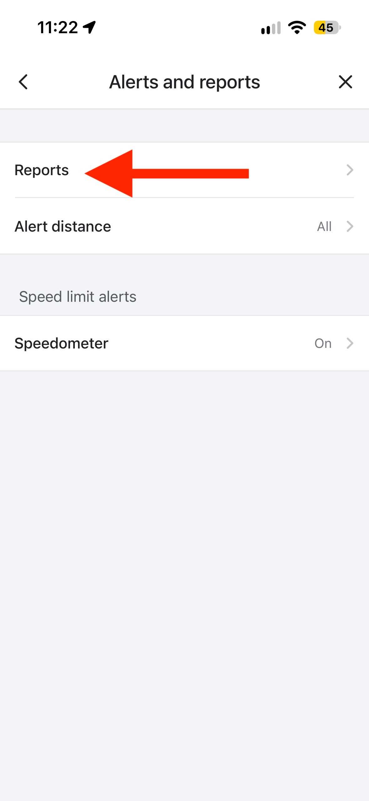 Waze Alerts and reports page with arrow pointing to Reports showing Alert distance and Speedometer options.