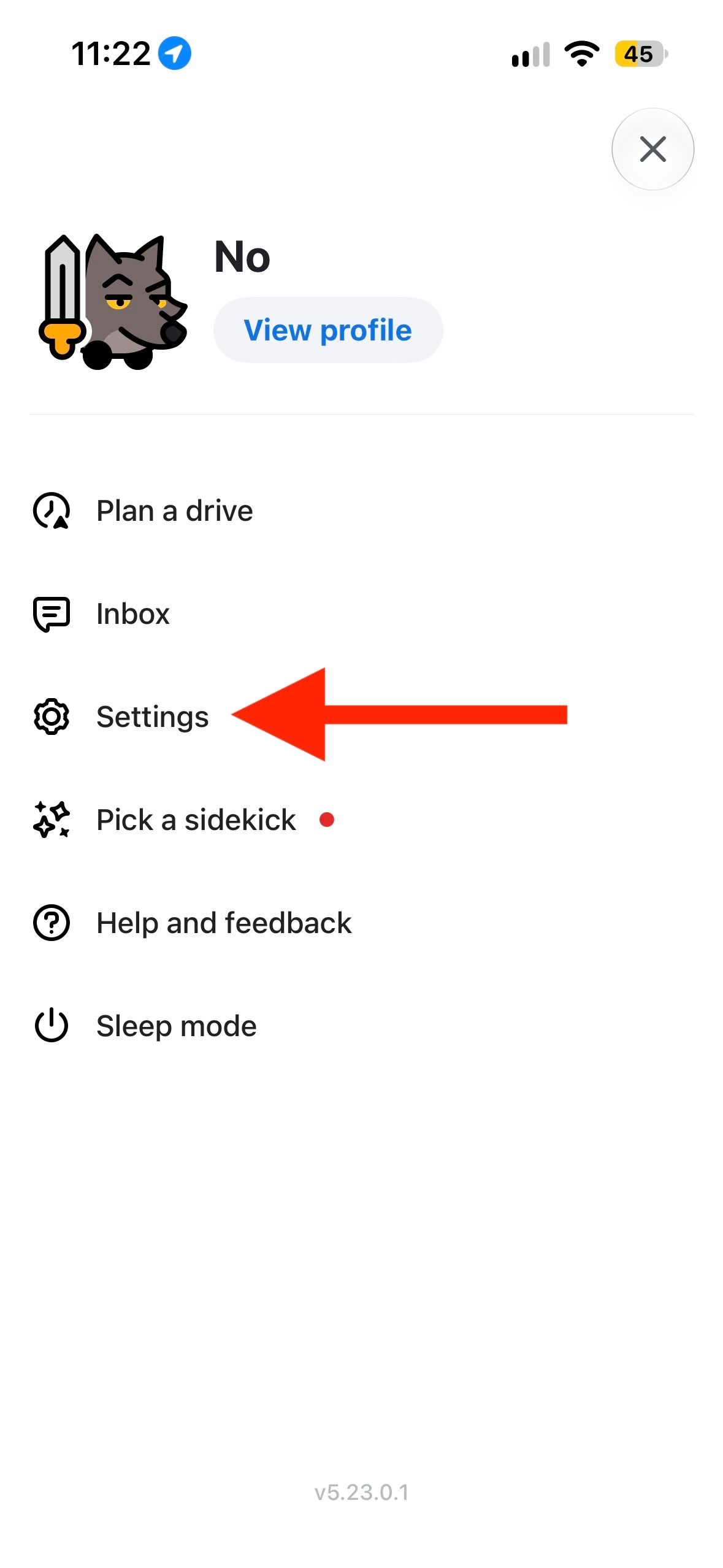 Waze menu screen with arrow pointing to Settings showing Plan a drive Inbox Pick a sidekick and Help and feedback options.