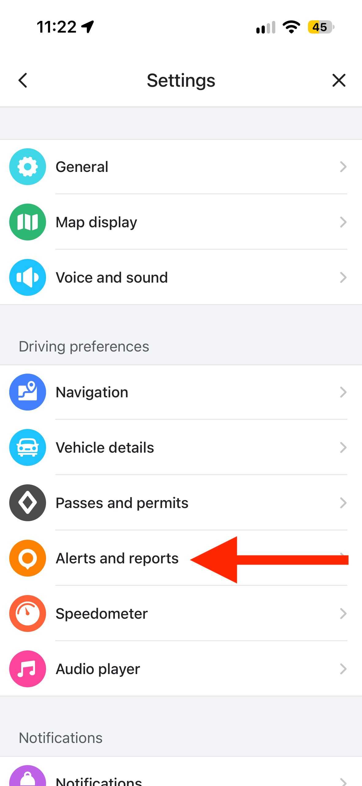 Waze Settings page with arrow pointing to Alerts and reports showing General Map display and Voice and sound options.