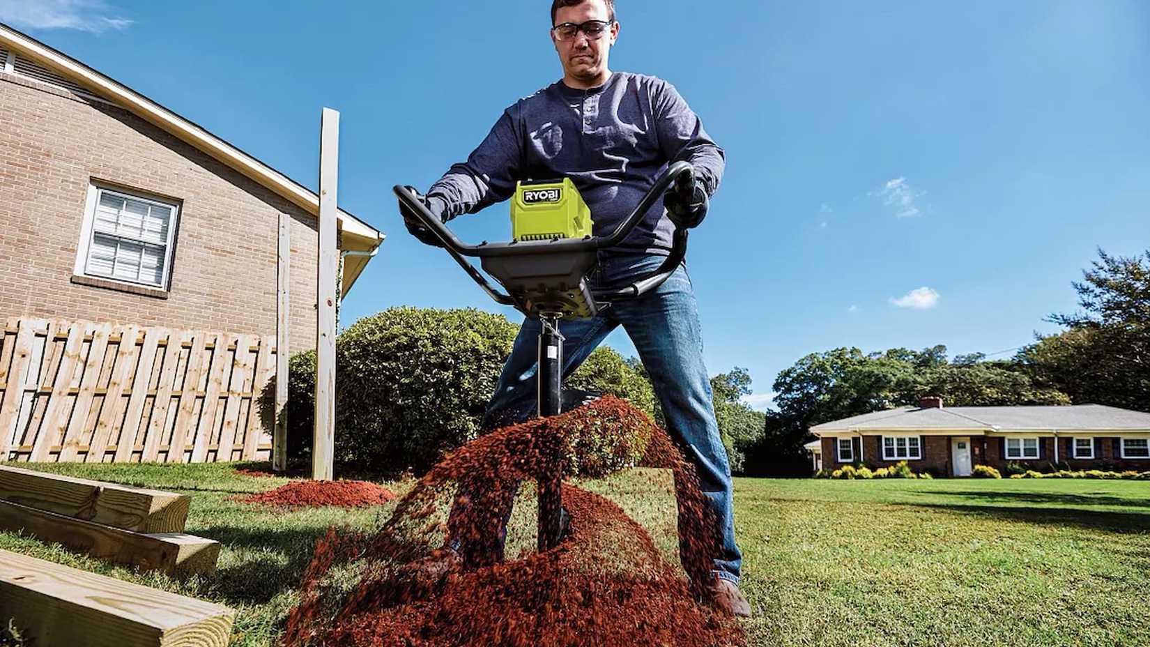 36V HP Brushless 200mm Post Hole Digger being used to dig up holes in a backyard