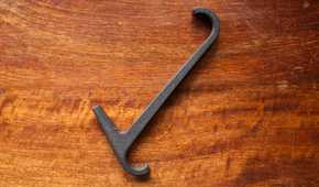 3D printed towel rail hook on a table.