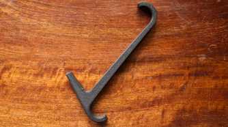 3D printed towel rail hook on a table.