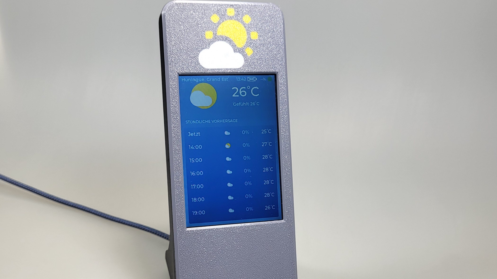 How a $5 radar sensor turns an ESP32 into a weather display that wakes when you walk up