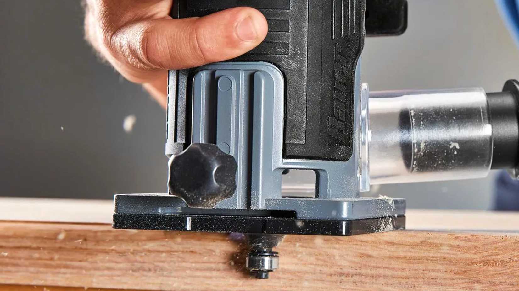 BAUER 20V Brushless Cordless Variable-Speed Compact Router, being used on wood.