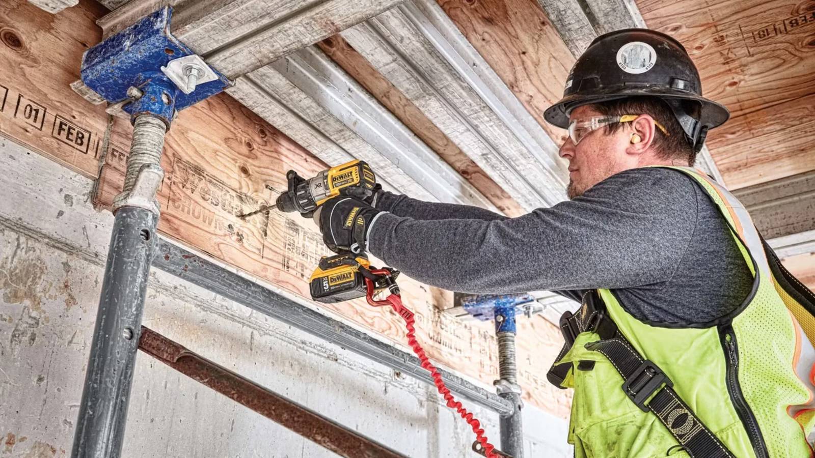 dewalt-man-drilling-into-joist