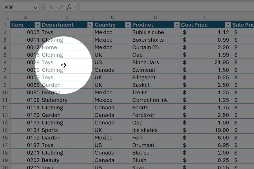 Find My Mouse PowerToys feature highlights a cursor over an Excel table.