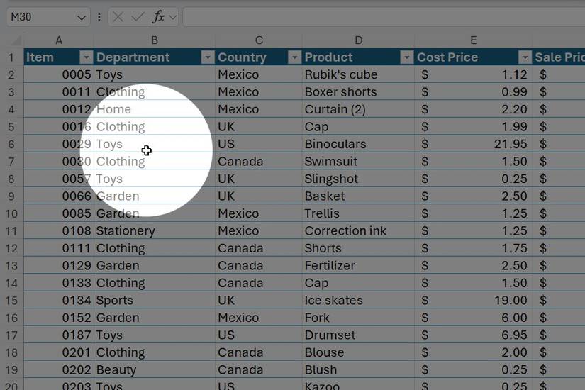 Find My Mouse PowerToys feature highlights a cursor over an Excel table.