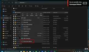 The Windows 11 right-click menu open in File Explorer, showing various options.