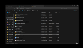 Windows File Explorer running on a PC, showing various folders and files.