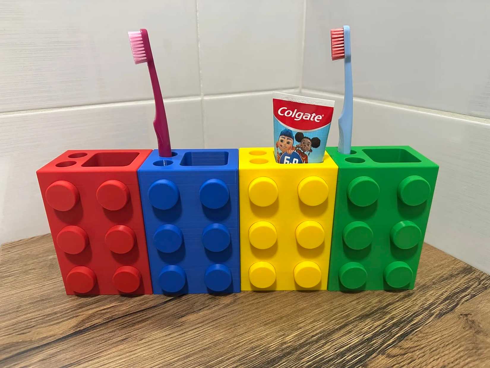 LEGO-themed toothbrush holders by Helust on MakerWorld.