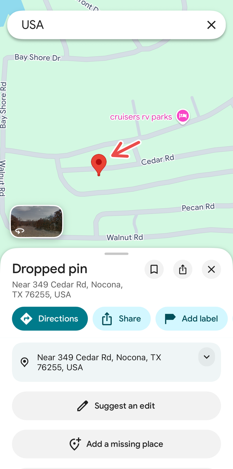 Dropping a pin on a random location on Google Maps.