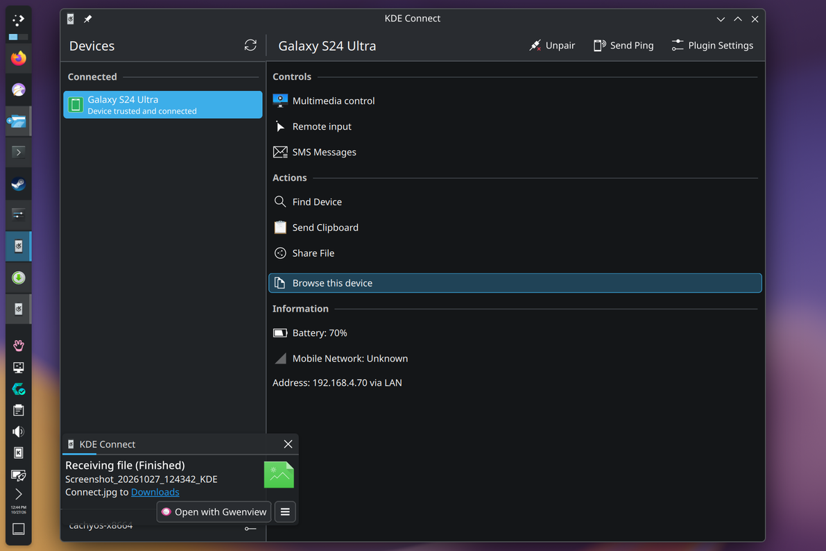 Screenshot showing a KDE Connect file transfer notification on a Linux desktop.