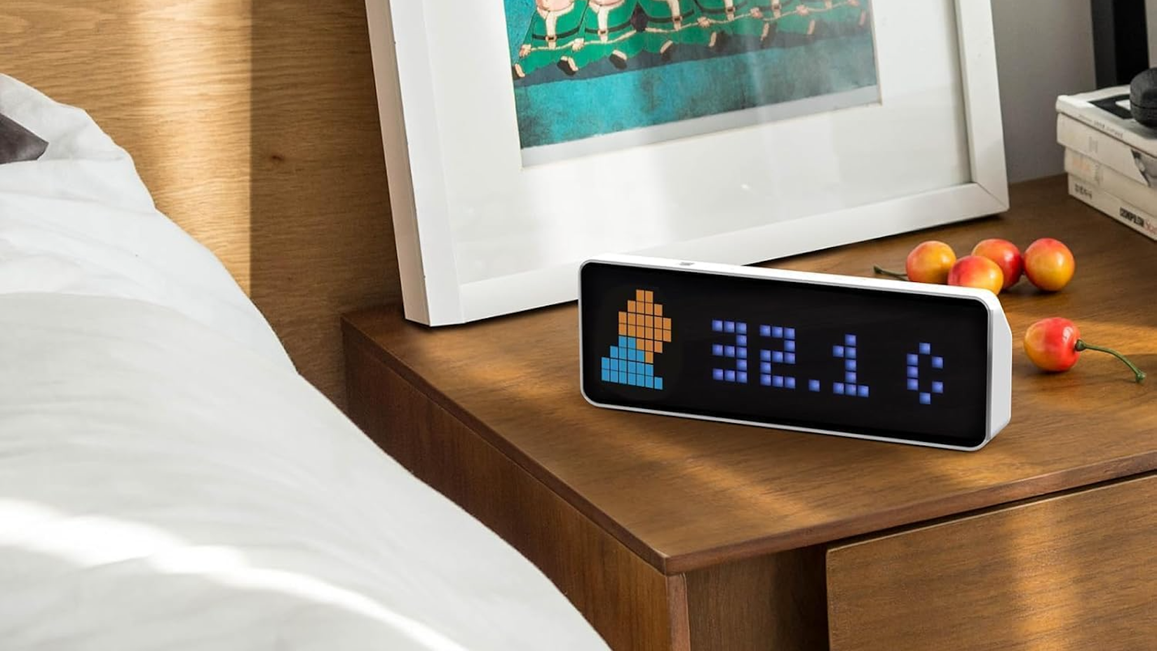 The Ulanzi TC001 Smart Pixel Clock on a nightstand.