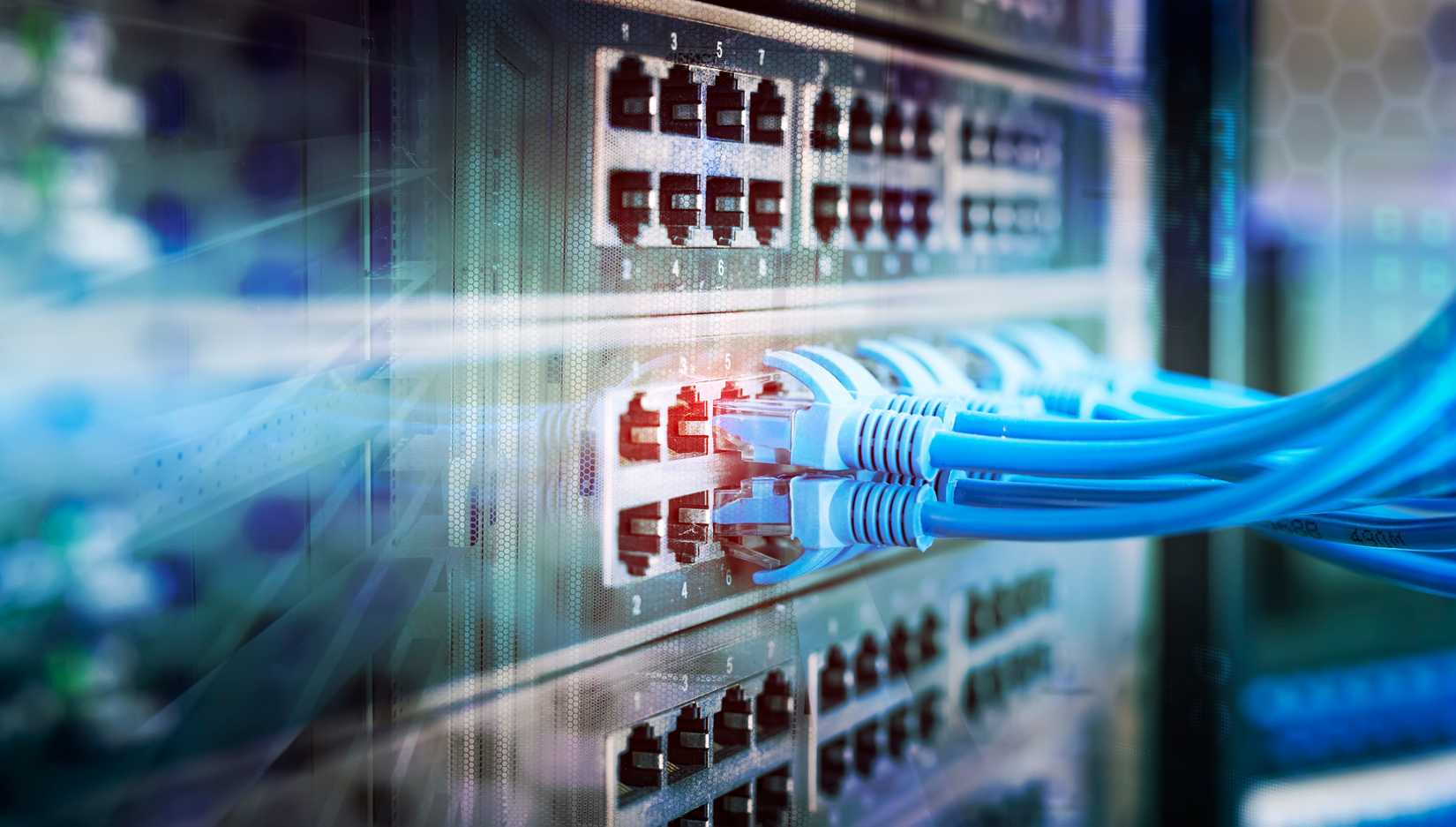 Network panel, switch and cable in data center.