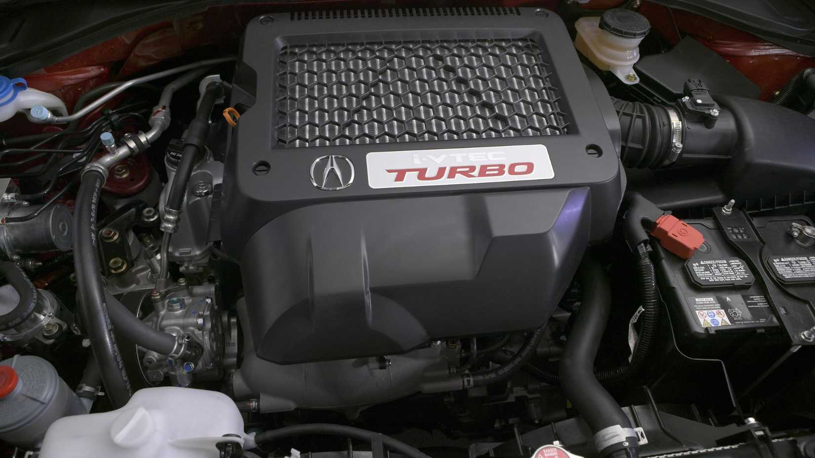 Close-up shot of the engine under the hood of a 2007–2009 Acura RDX.