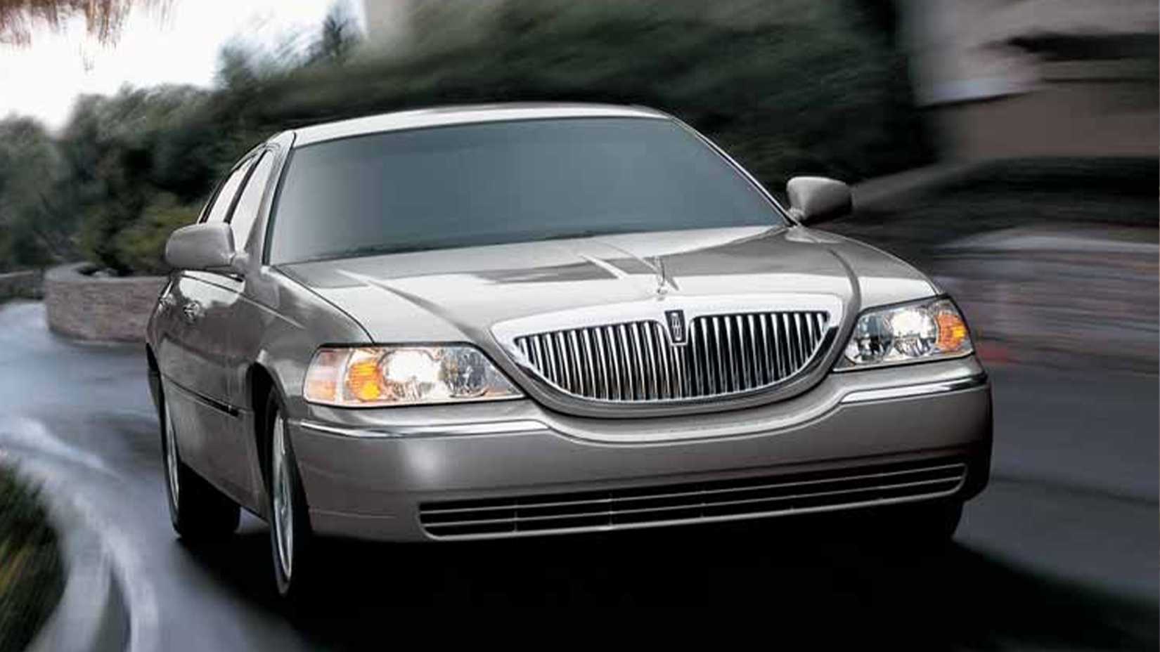 2009-2011 Lincoln Town Car Silver Front View Driving