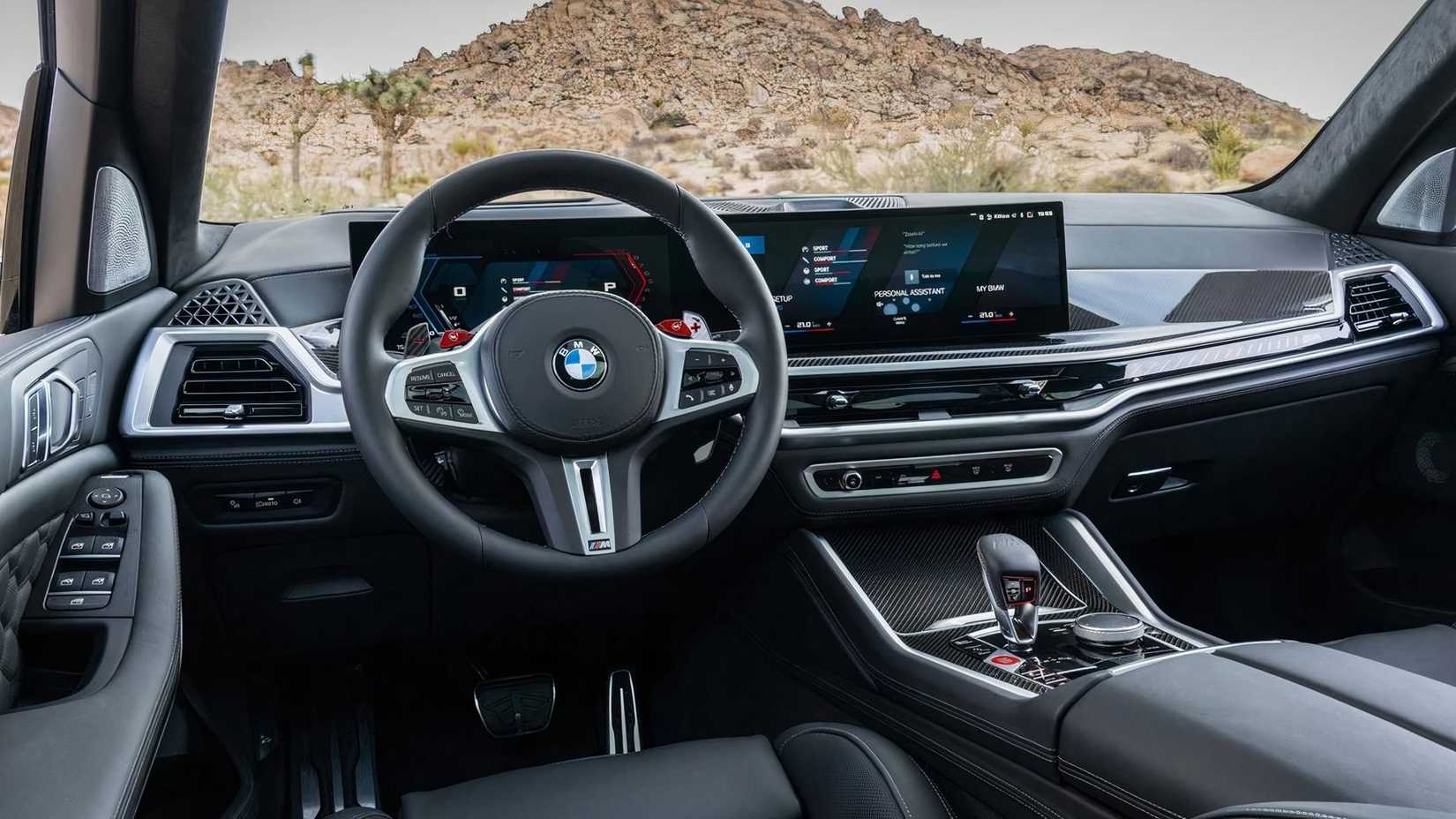 2025 BMW X5 M Competition's interior in black trim.