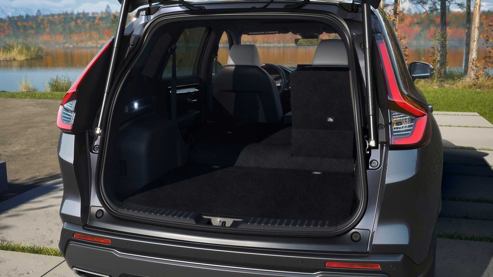 Shot inside the truink of a 2023–2025 Honda CR-V Hybrid, with the rear seats folded.