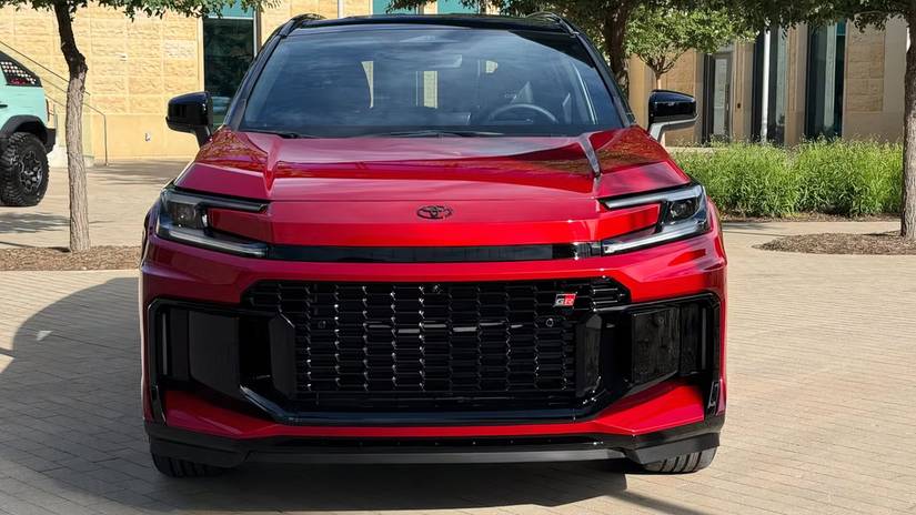 Static photo of the front of a red 2026 Toyota RAV4 GR